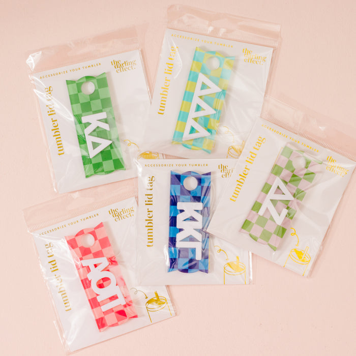 The Darling Effect's Kappa Delta Tumbler Lid Tag is a fun personalized gift featuring Greek letters and checkered designs—perfect for customizing your sorority tumbler lid collection.