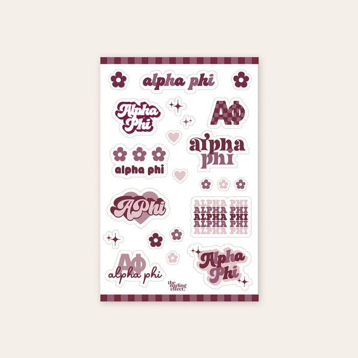 The Darling Effect’s Alpha Phi Sticker Sheet features assorted Alpha Phi texts, maroon and pink flowers, hearts, and borders on white—ideal for showing your sorority spirit and sisterhood pride.