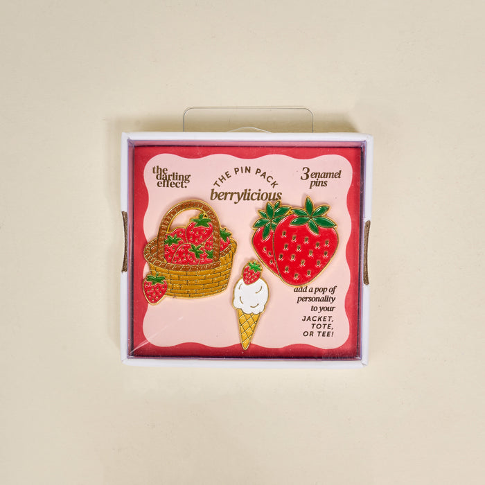 Berrylicious The Pin Pack by The Darling Effect includes three pins—a basket of strawberries, a big strawberry, and a strawberry-topped ice cream cone—perfect for adding charm to your jacket, tote, or tee.