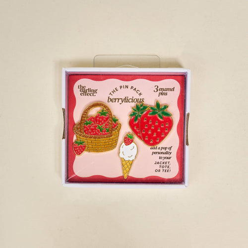 Berrylicious The Pin Pack by The Darling Effect includes three pins—a basket of strawberries, a big strawberry, and a strawberry-topped ice cream cone—perfect for adding charm to your jacket, tote, or tee.