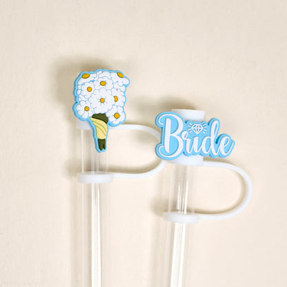 The Darling Effect’s Blooming Bride Straw Topper Set features silicone toppers shaped like a flower bouquet and "Bride" text, adding festive, leak-resistant charm to drinkware for bridal celebrations.