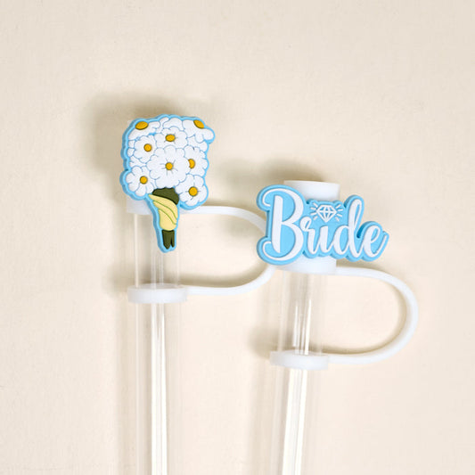The Darling Effect’s Blooming Bride Straw Topper Set features silicone toppers shaped like a flower bouquet and "Bride" text, adding festive, leak-resistant charm to drinkware for bridal celebrations.