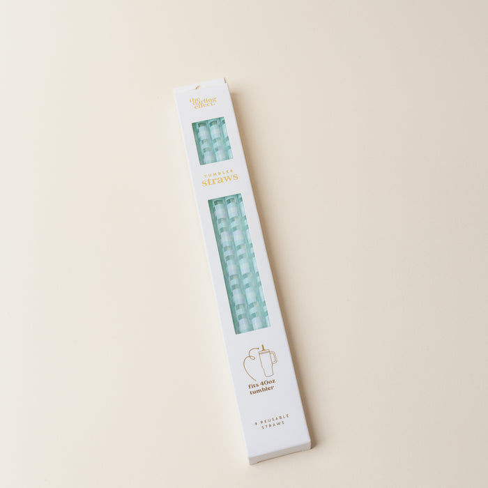 The Darling Effect Check Blue 40 oz Tumbler Straw Set comes in eco-friendly packaging with a window showing light blue striped reusable straws and gold and green text. Includes a simple cup illustration—ideal for 40 oz tumblers.