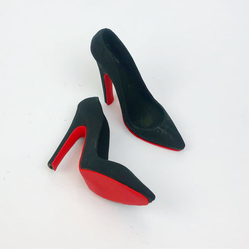 Our signature shoe in solid dark chocolate colored black with a trendy red bottom.