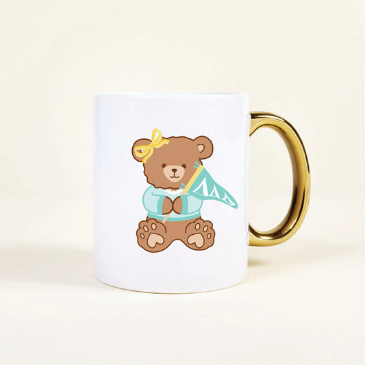 The Darling Effect's Delta Delta Delta 11 oz Cozy Cute Ceramic Mug features a ceramic teddy bear with a shiny gold handle—perfect for sorority celebrations and cozy moments.