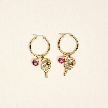 The Darling Effect's Dinking Around Signature Hoop Earrings feature popsicle-shaped charms with white rhinestones and a pink gem—perfect for adding a sparkling touch to your everyday look.