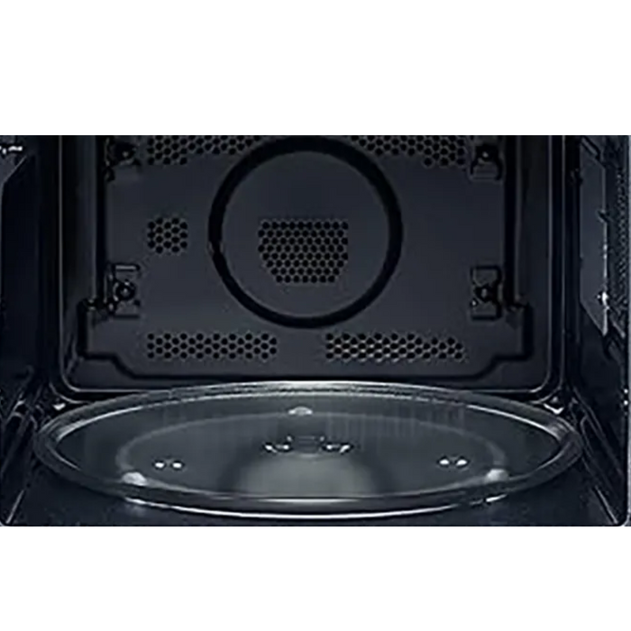 Interior of a black microwave with a turntable and heating elements.