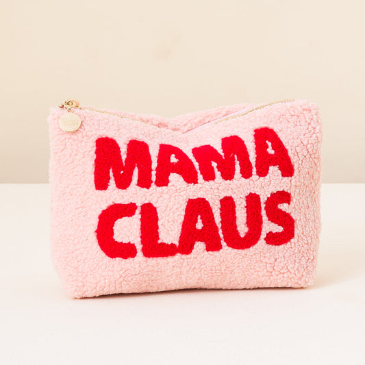 The Darling Effect’s Mama Claus Teddy Pouch is a fuzzy pink cosmetic bag with red embroidered “MAMA CLAUS” lettering and a gold zipper—perfect for festive travel or to brighten your Christmas teddy pouch collection.