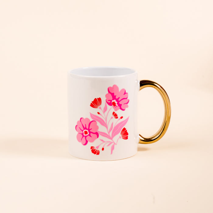 The Darling Effect's Poppin' Petals Hot Pink 11 oz Cozy Cute Ceramic Mug features a vibrant floral design and golden handle—perfect for enjoying your favorite coffee or tea.