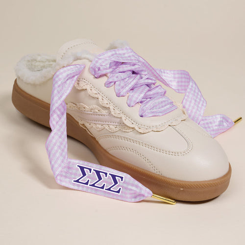 The Darling Effect's Sigma Sigma Sigma Step It Up Shoelaces feature gingham laces and an embroidered ΣΣΣ patch, designed to add sorority style to any sneaker.