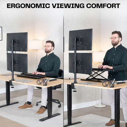 Model going from sit to stand at desk using vertical dual monitor mount.
