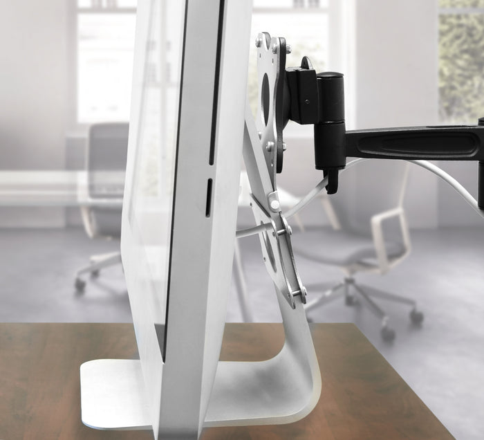Metal Mac VESA plate adapter.