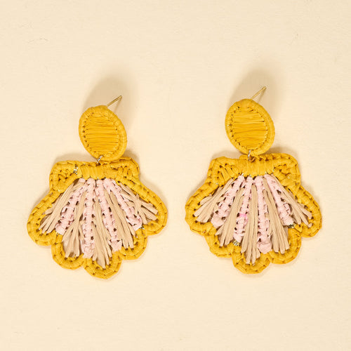 The Darling Effect’s Yellow Cabana Breeze Earrings feature scalloped, fan-shaped yellow raffia with tan and light pink strands—lightweight and perfect for everyday boho style.