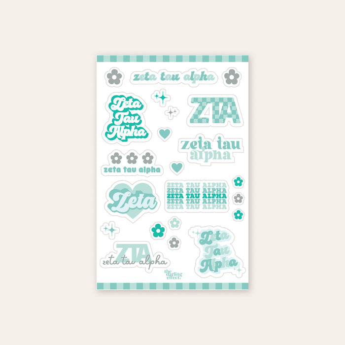 Show your sisterhood spirit with The Darling Effect’s Zeta Tau Alpha Sticker Sheet, featuring teal and white designs, hearts, flowers, and stylish text—perfect for displaying your ZTA pride!.